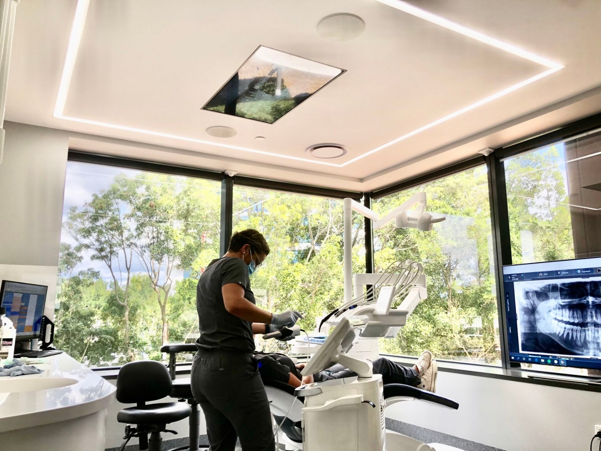 Dental treatment center with monitor for digital scanning in a practice.