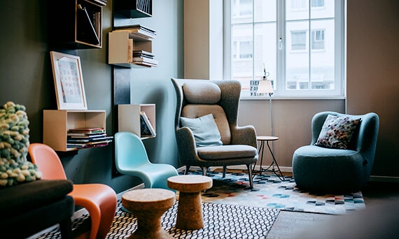 Waiting room for a family with adult and child-sized chairs 