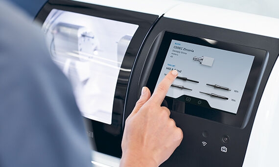 CEREC Primemill, touch interface in use